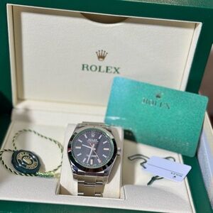 Rolex Men's Black Dial Silver Bracelet Watch